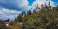 Aerial view of Bran castle or famous Dracula's castle, close to Bran, Romania on a cloudy summer day