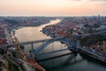Aerial view of a bridge in the city of Porto during sunset. Portugal in the summer Royalty Free Stock Photo