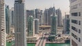 Aerial view on Dubai Marina skyscrapers and the most luxury yacht in harbor timelapse, Dubai, United Arab Emirates Royalty Free Stock Photo