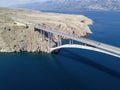 Aerial view of the bridge of the island of Pag, Croatia, roads and Croatian coast. Cliff overlooking the sea Royalty Free Stock Photo