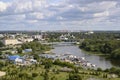 Aerial view of the bridge over the Kotorosl River, a boat dock, a park and buildings from different centuries in Yaroslavl, Russia
