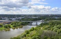 Aerial view of the bridge over the Kotorosl River, park and buildings of different centuries in Yaroslavl, Russia