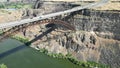 Aerial view of a bridge over a river flowing along the cliffs Royalty Free Stock Photo