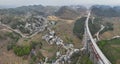 Aerial view of bridge and remote village in Guizhou, China