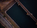 Aerial view of a bridge spanning across a John Day Dam on a sunny day Royalty Free Stock Photo