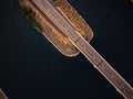 Aerial view of a bridge spanning across a John Day Dam on a sunny day Royalty Free Stock Photo