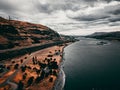 Aerial view of a bridge spanning across a John Day Dam on a sunny day Royalty Free Stock Photo