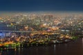 Aerial view of bridges and roads in Osaka downtown. Skyline with skyscraper buildings in Kansai district, urban city, Japan.