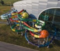 Aerial View Of Bright Colored Water Slides. Professional construction of waterslide in water park