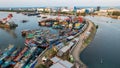 Aerial view of the Bright spring cityscape of Pluit port. Colorful sunset view of Jakarta, Indonesia. Beautiful Jakarta seascape.