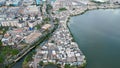 Aerial view of the Bright spring cityscape of Pluit port. Colorful sunset view of Jakarta, Indonesia. Beautiful Jakarta seascape.