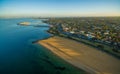 Aerial view of Brighton beach and suburb at sunrise. Melbourne,