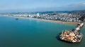 Aerial view of the Brighton West Pier in Brighton, England on blue sky background Royalty Free Stock Photo