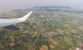 Aerial View of Bristol City Center in England, UK  and surrounding fields. On the left the airplane wing Royalty Free Stock Photo