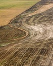 Aerial view of brown cropland recently harvested