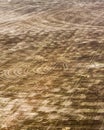 Aerial view of brown cropland recently harvested