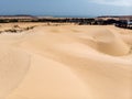 Aerial view of brown winding sand dunes in Muine