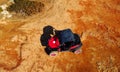 Aerial view of buggy car on the sandy on the sea coast of Cyprus or Greek in summer. Extreme trip off road place. Outdoor