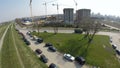 Aerial view of building site and a crane at the periphery of city