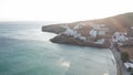 Aerial view of buildings on a hill near the mediterranean sea, Tinos Island, Greece