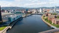 Aerial view on buildings and Lagan River in City center of Belfast Northern Ireland. Drone photo, high angle view of town Royalty Free Stock Photo