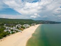 Aerial view of the Bulgarian town of Albena unfolds along the picturesque seaside. Its sandy beaches, stretching as far