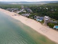 Aerial view of the Bulgarian town of Albena unfolds along the picturesque seaside. Its sandy beaches, stretching as far