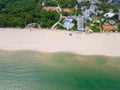 Aerial view of the Bulgarian town of Albena unfolds along the picturesque seaside. Its sandy beaches, stretching as far