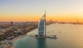 Aerial view of Burj Al Arab Jumeirah Island or boat building, Dubai Downtown skyline, United Arab Emirates or UAE. Financial Royalty Free Stock Photo