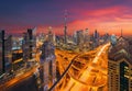 Aerial view of Burj Khalifa in Dubai Downtown skyline and highway, United Arab Emirates or UAE. Financial district and business