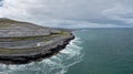 Aerial view of the Burren Coast in County Clare with the Black Head Lighthouse on the rocky point