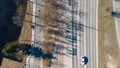Aerial View of buss stop Multi-Lane Road with Tree Shadows Royalty Free Stock Photo