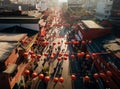 Aerial view of a bustling Chinatown street, bathed in the warm glow of sunset, with red lanterns swaying in the festive Royalty Free Stock Photo