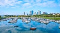 Aerial View of Bustling Marina with Sailboats and Urban Skyline, Milwaukee