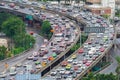 Aerial view of busy cars with traffic jam in the rush hour on highway road street on bridge in Bangkok Downtown, urban city in Royalty Free Stock Photo