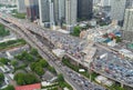 Aerial view of busy cars with traffic jam in the rush hour on highway road street on bridge in Bangkok Downtown, urban city in Royalty Free Stock Photo