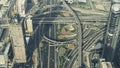 A busy city road interchange in Dubai Downtown, aerial view. United Arab Emirates Royalty Free Stock Photo