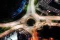 Aerial view of a busy city roundabout street at night rush hour Royalty Free Stock Photo