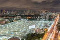 Aerial view of busy industrial under construction site workers working with cranes and excavators. Precast concrete slap floor Royalty Free Stock Photo