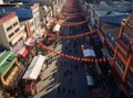 Aerial view of a busy street in China, decorated with red lanterns and banners for Chinese New Year. Royalty Free Stock Photo