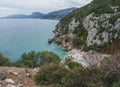 Aerial view of Cala Fuili beach near Cala Gonone, Gulf of Orosei, Sardinia island, Italy. White pebbles beach with Royalty Free Stock Photo