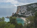 Aerial view of Cala Luna beach near Cala Gonone, Gulf of Orosei, Sardinia island, Italy. White sand beach with lime Royalty Free Stock Photo