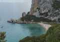 Aerial view of Cala Luna beach near Cala Gonone, Gulf of Orosei, Sardinia island, Italy. White sand beach with lime Royalty Free Stock Photo