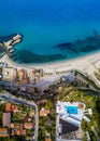 Aerial view of the Calabrian coast, villas and resorts on the cliff. Transparent sea and wild coast Royalty Free Stock Photo