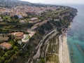 Aerial view of the Calabrian coast, villas and resorts on the cliff. Transparent sea and wild coast Royalty Free Stock Photo