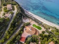 Aerial view of the Calabrian coast, villas and resorts on the cliff. Transparent sea and wild coast Royalty Free Stock Photo