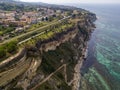 Aerial view of the Calabrian coast, villas and resorts on the cliff. Transparent sea and wild coast Royalty Free Stock Photo