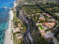 Aerial view of the Calabrian coast, villas and resorts on the cliff. Transparent sea and wild coast Royalty Free Stock Photo