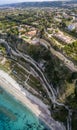 Aerial view of the Calabrian coast, villas and resorts on the cliff. Transparent sea and wild coast Royalty Free Stock Photo