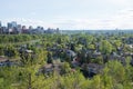 Aerial view of Calgary in springtime. Downtown, river, houses and trees. Canada